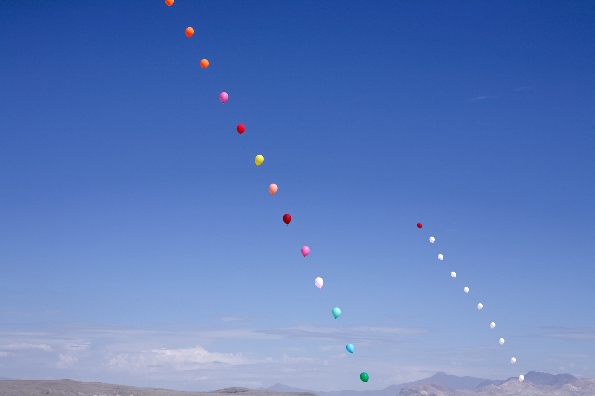 balloons in the air, with bells